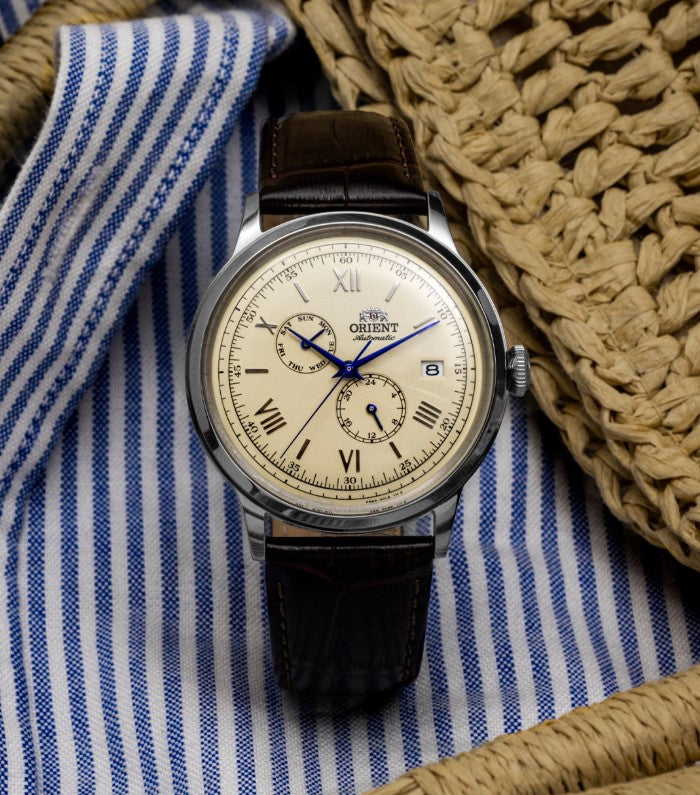 Orient Bambino (Champagne Dial) Version RA-AK0702Y with Weekly Calendar (Imported)