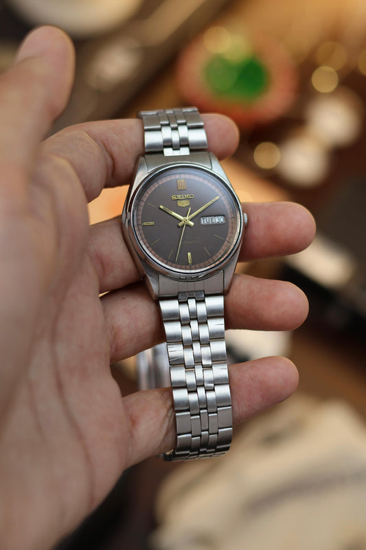 Seiko 5 watch from the 1980s in stainless steel with original brown dial design