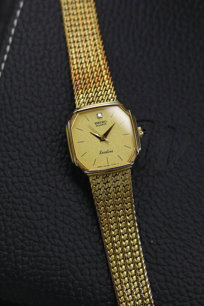 (JDM - Extremely Rare) 1985 Seiko Exceline Ladies Champagne Shimmer Snowflake Dial with SOLID GOLD PLATED Case & Integrated Milanese Leaf-Carved Bracelet - Japanese Vintage Watch (Pre Owned) - SE794