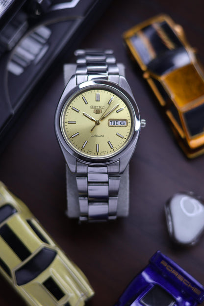 (Super Rare) Seiko 5 SNXA Gold Sunray Dial with Glass Back - Automatic Vintage Watch (Pre Owned) - SE460