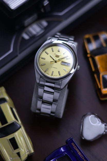 (Super Rare) Seiko 5 SNXA Gold Sunray Dial with Glass Back - Automatic Vintage Watch (Pre Owned) - SE460