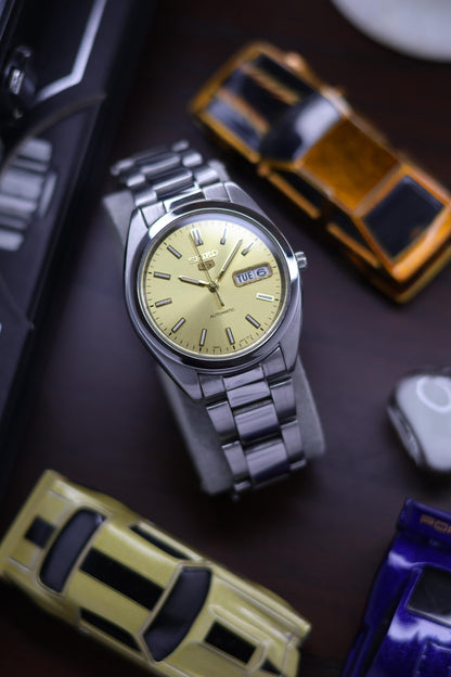 (Super Rare) Seiko 5 SNXA Gold Sunray Dial with Glass Back - Automatic Vintage Watch (Pre Owned) - SE460